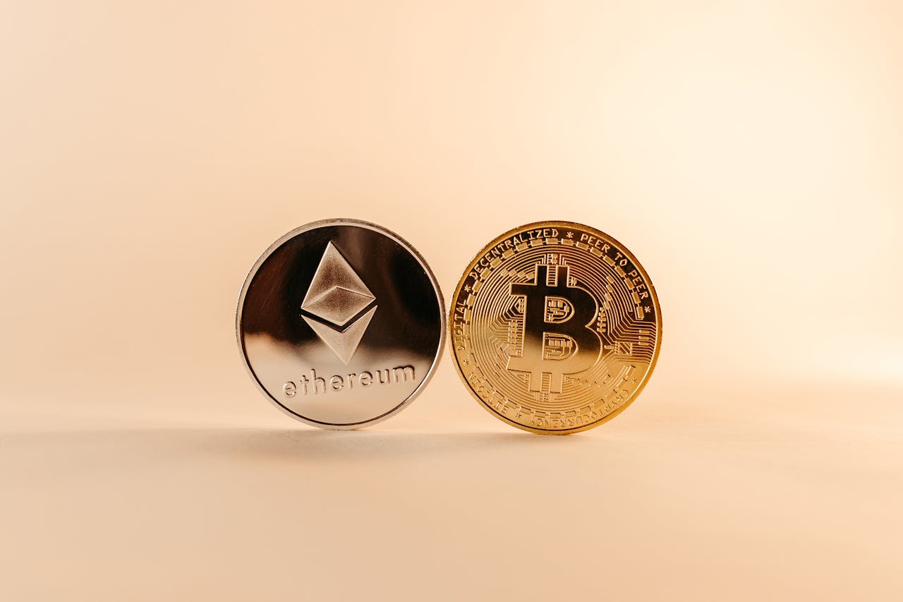services-03 Close-up of Bitcoin and Ethereum coins symbolizing digital currency and blockchain technology.