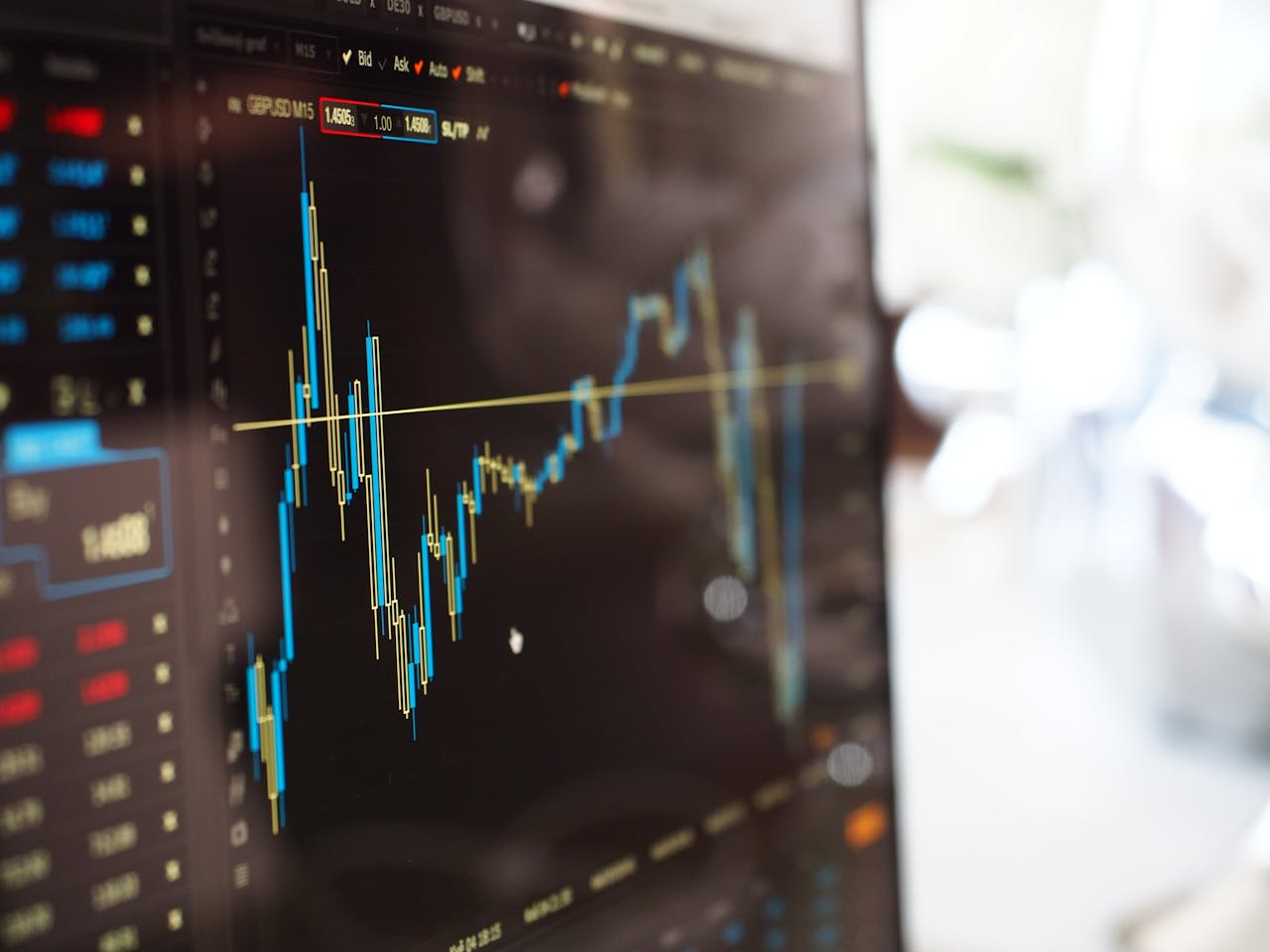heros-img Detailed view of financial trading graphs on a monitor, illustrating stock market trends.